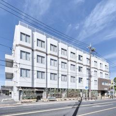 冈三酒店