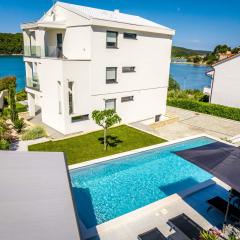 Villa Veronica with pool and boat mooring first line at sea