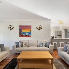 Spacious 4-Bed Home 2-Min to the Beach