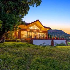 StayVista at Three Shores with Lake View & Alfresco Dining