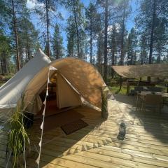 LaplandLiv Glampingtent with private sauna at the lake!