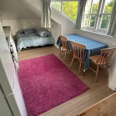 Cosy attic flat with views