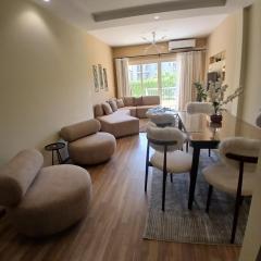 Luxerious apartment with a private garden and pool access