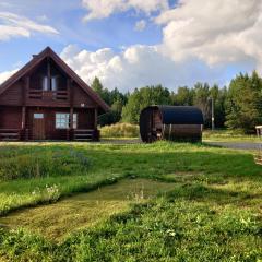 Tapa Cottage next to disc golf.