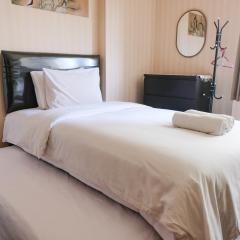 Homey and Cozy Studio Room at Suites @Metro Apartment By Travelio