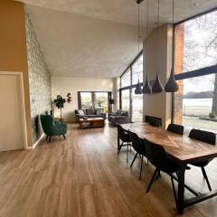 Luxe recreatiewoning midden in bosrijke omgeving