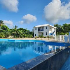 Bella Villa room with large pool and close to beach