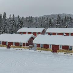 Marsfjäll Mountain Lodge Stugor i Saxnäs