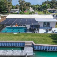 Modern Waterfront Pool Home with Dock