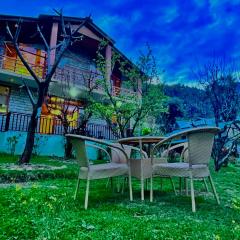 The Manu Emerald # farmHouse # top selling cottage in manali # peaceful heritage cozy stay # lawn with bonfire # most awarded