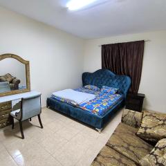 Rooms opposite mega mall in telephone shops roundabout flat no 203