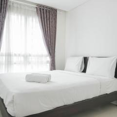 Comfort 1BR Apartment with Study Room at Woodland Park Residence By Travelio