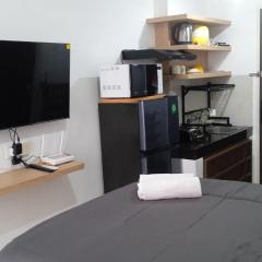 FREE WIFI, NETFLIX, SMART TV, MINERAL WATER, AMENITIES - Studio with Foldable Wall Bed at Serpong Garden Apt