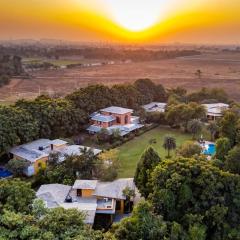 StayVista at The Manvi Estate - Pool, WiFi & Bonfire
