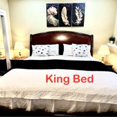 Cozy Walkout suite with King bed, Kitchen, Parking & Patio