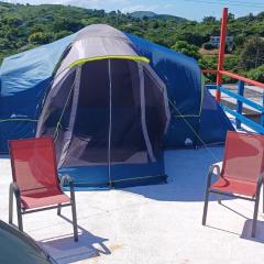 Rooster Run Glamping Camping has rooftop and off the ground Glamping experience for 1 to 16 in a single tent and views of The Rain Forrest and to Culebra across the Atlantic Ocean w Tents, Linens, Deluxe Air Beds, Warm Shower and More at a Great Price