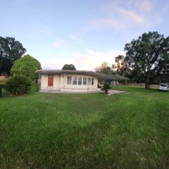 Country Home in the City with an Acre of Land