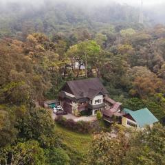 Nature Valley Farmhouse Resort by Raarees, Munnar #lap of nature #premium rooms #big parking #scenic view #garden with fireplace #property of the year