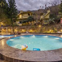 ELIVAAS Zephyr Sierra - 2 BHK Hillside Retreat With Common Pool, Gym & Restaurant