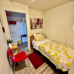 Tiny Private Room at the Upper Level of a Big House with Shared Bathroom
