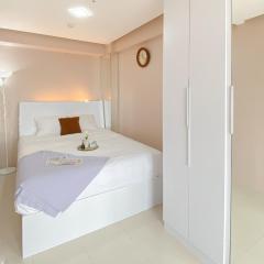Homey 1BR Apartment @ Bassura City By Travelio