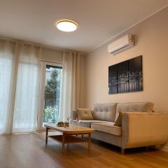 Modern terraced apartment with green garden