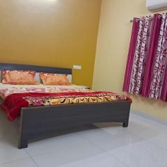 A C Room Near Devka Beach with Refrigerator,Microwave, RO Water