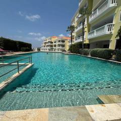 Modern appartement bij zee met zwembad op Blue Bay - Tripletree the hill