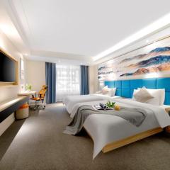 Happy Manju Hotel--Harbin Haxi High-speed Railway West Station Wanda Plaza Branch