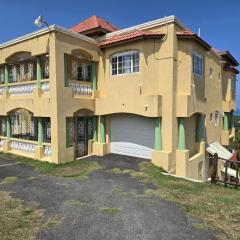 Poinciana House