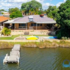 Canal-Side Retreat with Private Jetty