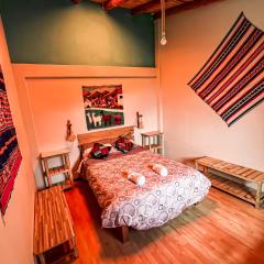 Casita con cocina privada, patio y jardin