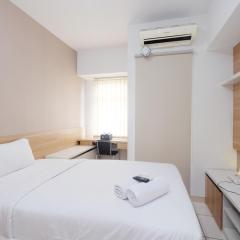 Modern Studio with Great Lake View at Springlake Summarecon Apartment By Travelio