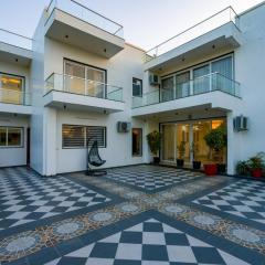ELIVAAS AdhiVa 5-BHK Farmhouse with Private Pool, Bar & Lush Garden