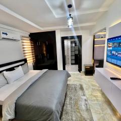Konar-Apts, Cozy Room with private kitchen, City view Balcony, 24hrs power, Security, Wifi, Gwarinpa Express by Dawaki Junction