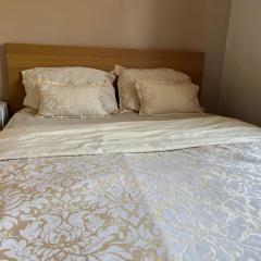 Master Bedroom Kingsize Bed work desk and wardrobe