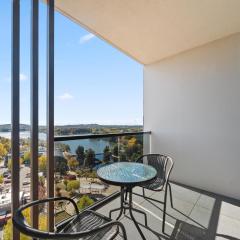 Sleek 2-Bed Apartment with Rooftop Garden Access