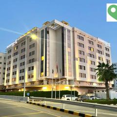 Golden Tulip Muscat