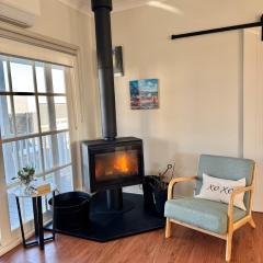 Coastal Sanctuary, Pet Firendly with Fireplace, wood provided Just 50m to Kilcunda Beach and 100m to the Ocean View Hotel The Sticks and Copper Door Kitchen Accessibility Friendly