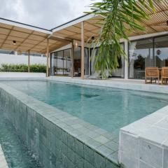 Tropical Peaceful Poolside Retreat by Sea N' Rent