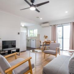 Modern 2BR Apartment Near Portside & Airport