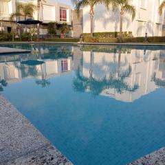 Appartement Familial avec Jardin, Résidence avec Piscine Dar El Bahr