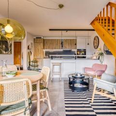 Spacieux duplex avec accès direct au bains
