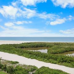 Beachfront condo with pool and balcony facing beach