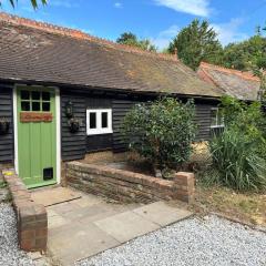 A charming cottage nestled in a peaceful woodland