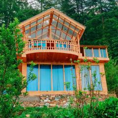 Glass House by Himalayan Cedar Nest