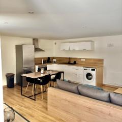 Appartement plein coeur village