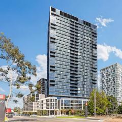 Olympic Park 2BR Pool gym access and walk to stadium