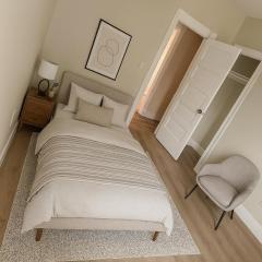 Spacious 4BDR 2BA Retreat near T-Station- 5 Mins to Boston
