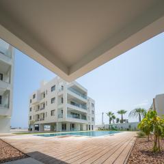 Serene Gardens 2BR Stylish Apartment with Pool and Gym
